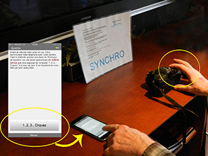 Cliquez sur le bouton “1..2..3.. Cliquez” du logiciel en même temps que vous prenez la photographie du panneau de synchronisation.
